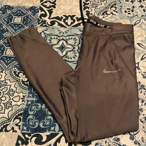 Women’s Nike Dri Fit athletic pants with pockets